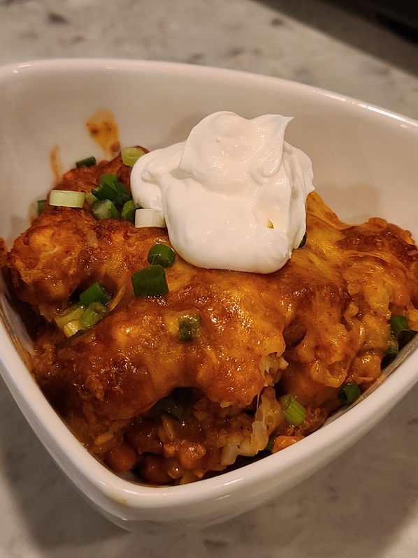 https://growingupgarlicky.com/wp-content/uploads/2021/03/Finished-Chili-Dog-Tater-Tot-Casserole-w-sour-cream.jpg